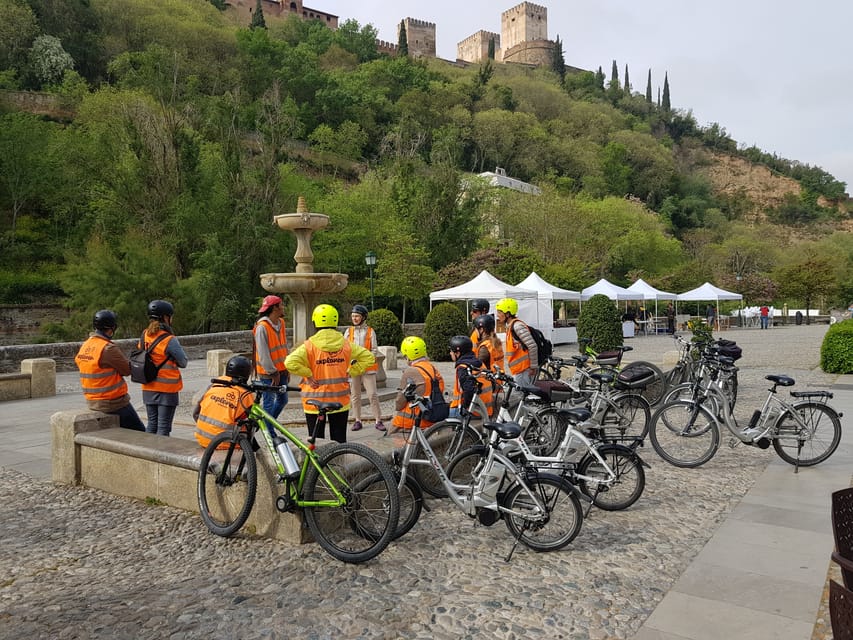 Granada: E-Bike Tour and Fast-Track Alhambra Ticket - Sacromonte, cave houses, and flamenco country