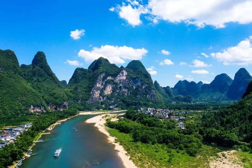 Guilin: Li River Cruise, Yangshuo Biking & Flexible Pricing - The 8:00 AM pickup and ride to the pier