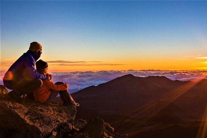 Haleakala Sunrise Best Guided Bike Tour with Bike Maui - Sunrise above the clouds, when weather cooperates