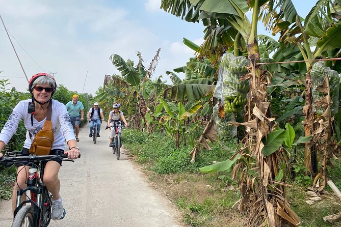 Hanoi City Bike Tour through Banana Island & Food Tasting - Starting with pickup and bike selection