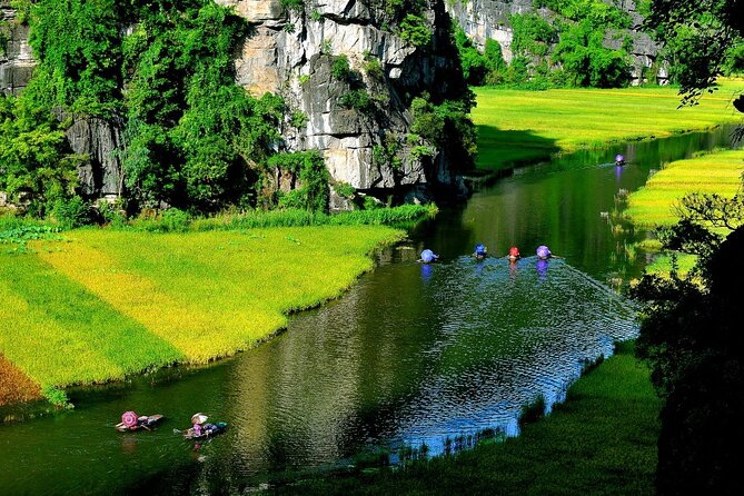 Hoa Lu - Tam Coc - Ninh Binh Day Tour: Biking, Visit Local Family - Cycling through rice fields and village lanes