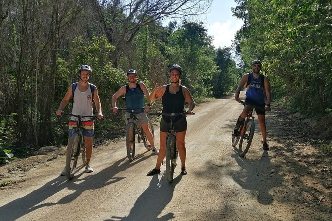 Jungle Bike Tour from Playa del Carmen with Bath in a Cenote - Arriving at the clear-water cenote