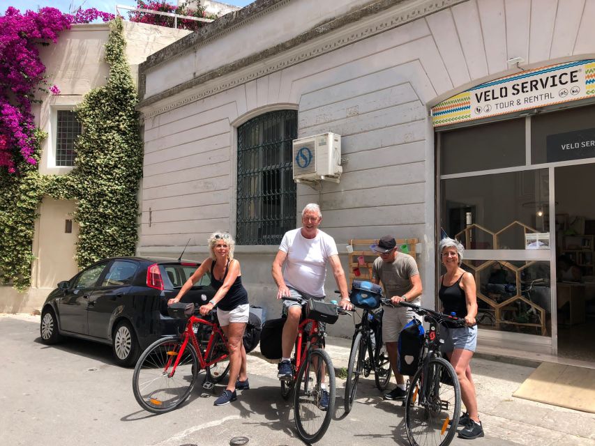 Lecce: City Highlights Guided Tour by Bike - Piazza Sant’Oronzo and the Roman amphitheater