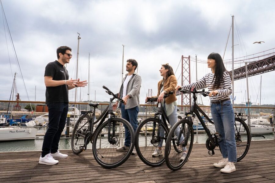 Lisbon: Guided Bike Tour, Helicopter Flight, and Boat Trip - The guides make the busy schedule work