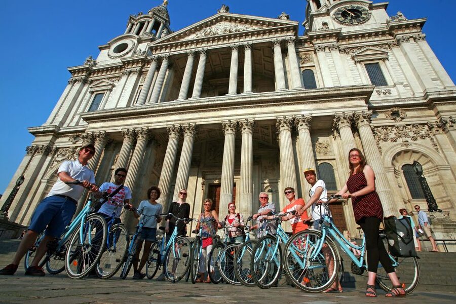 London: East London Town 3.5-Hour Bike Tour - Crossing Tower Bridge toward St. Katharine’s Dock