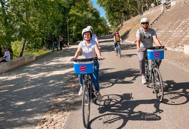 Lyon: Guided City Bike Tour - Place Bellecour and the Rhône riverbanks