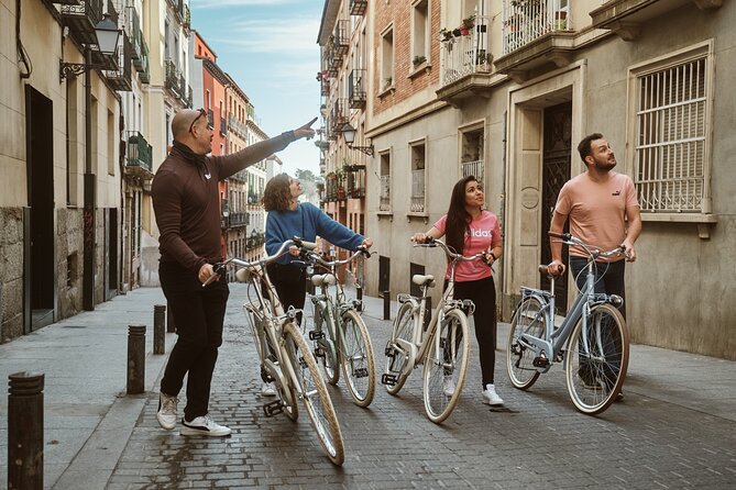 Madrid: City Highlights Guided Vintage Bike Tour - The Royal Palace and Almudena Cathedral