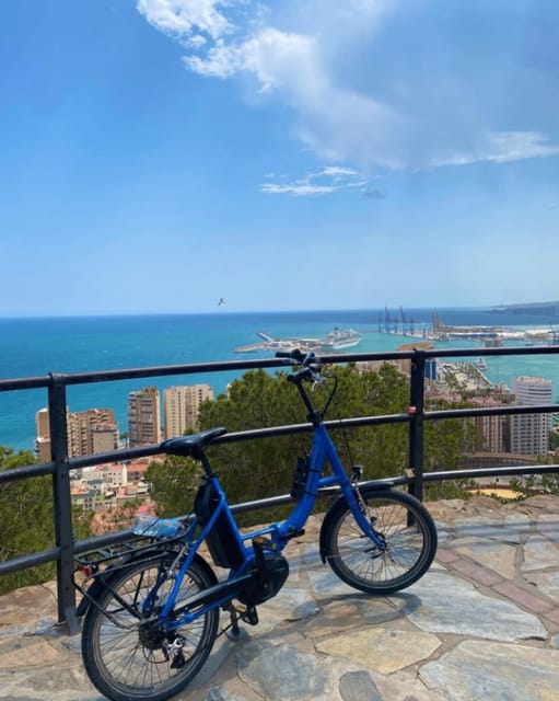 Malaga: Castle Hill and Fisherman Village E-Bike Tour - The quick take