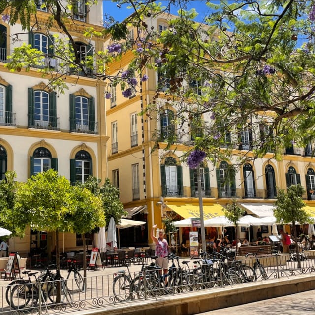 Malaga: Castle Hill and Fisherman Village E-Bike Tour - Beach riding toward Miramar Palace