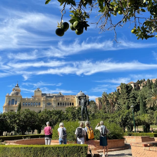 Malaga: Castle Hill and Fisherman Village E-Bike Tour - The guides shape the experience