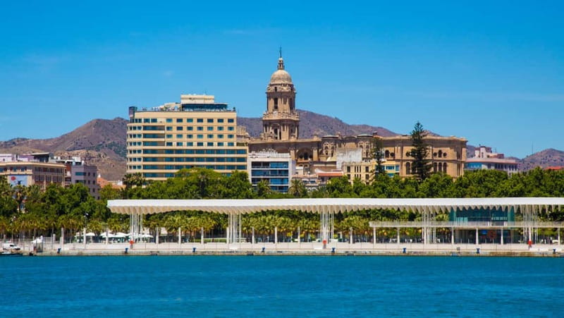 Malaga: Castle Hill and Fisherman Village E-Bike Tour - Starting among Málaga’s central streets