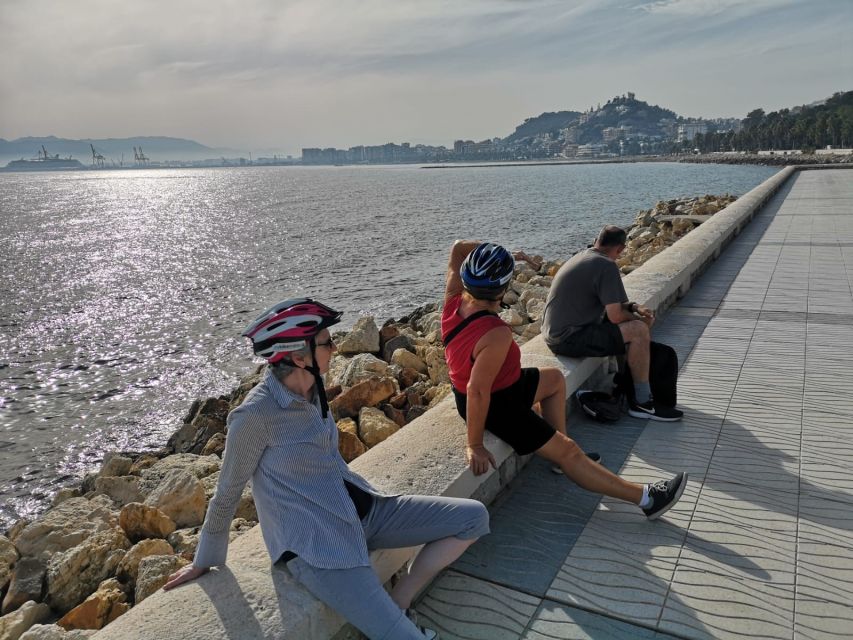 Malaga: Guided E-Bike Tour - Passing the Alcazaba walls and heading to the sea