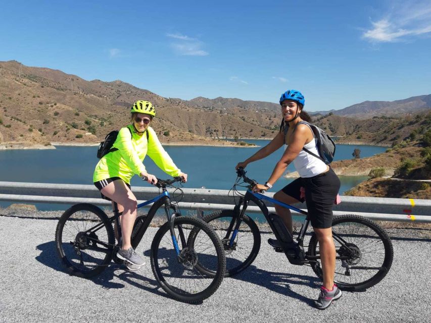 Málaga: Scenic Easy 3-Hour E-Bike Tour in Montes de Málaga - The downhill return and Málaga neighborhoods