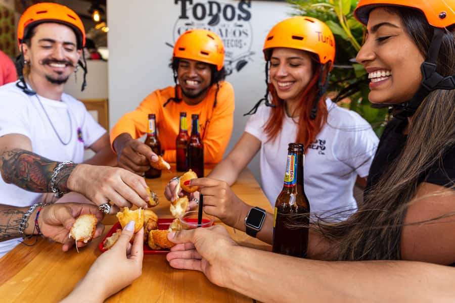 Medellín: E-bike and Foodie Tour - Conquistadores adds everyday snacks and city change