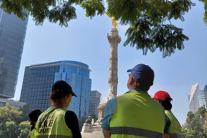 Mexico City E-Bike Tour with a taco and churros stop - El Ángel and the city’s patriotic symbol