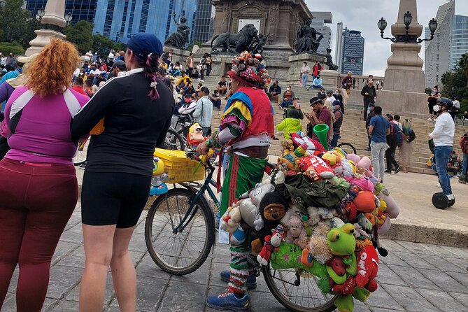 Mexico City E-Bike Tour with a taco and churros stop - Chapultepec and the flying dancers