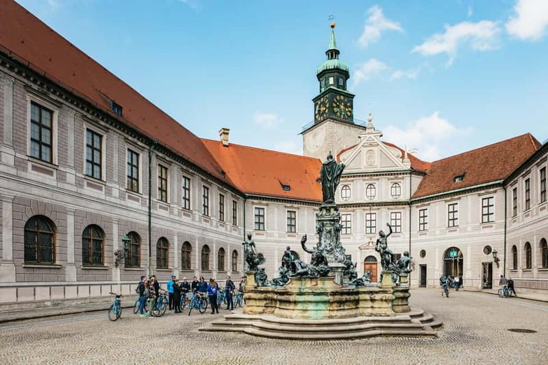 Munich: Guided City Tour by Bike with Beer Garden Stop - Starting beneath the Old Town Hall clock