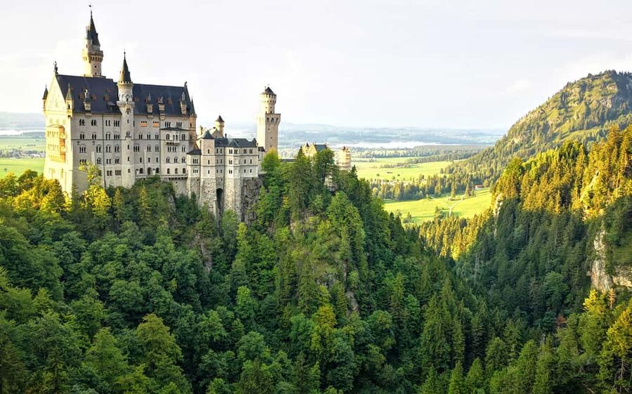Munich: Neuschwanstein Castle by Bus with Alpine Bike Ride - Cycling beside the alpine lake