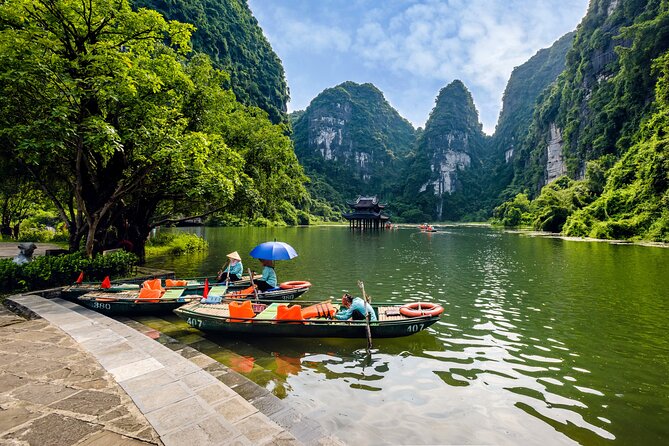 Ninh Binh Day Trip: Hoa Lu-Trang An/Tam Coc-Mua Cave-Cycling-Boat - Trang An boat ride through caves and temples