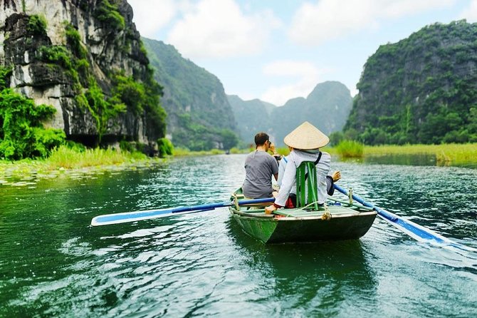 Ninh Binh Tour: Deluxe & Small Group Tam Coc Hoa Lu - Boat, Biking, Buffet Lunch - Tam Coc by wooden boat