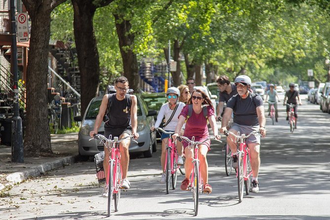 Non Touristy Pink Bike Tour by Spade & Palacio - A park picnic with sandwich, pastry, and local beer