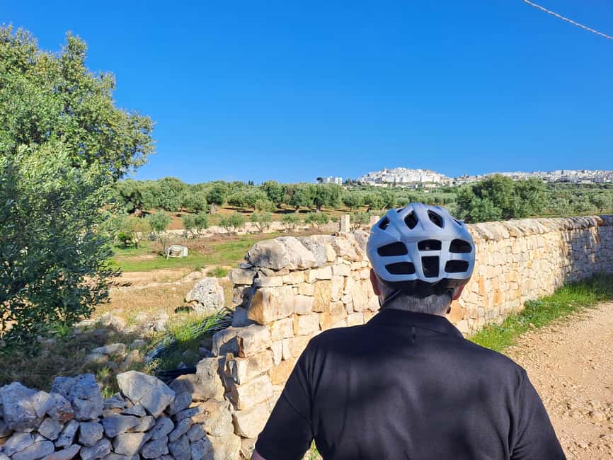 Ostuni: Guided e-bike tour to rock village & olive trees - The rock village and its cave-like settlements