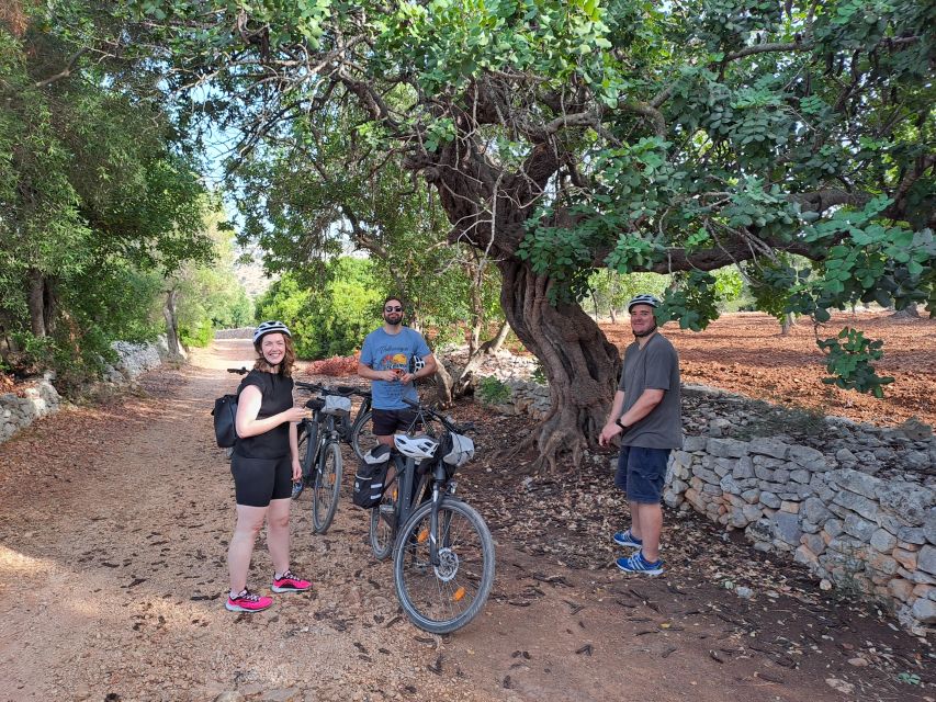 Ostuni: Guided e-bike tour to rock village & olive trees - What the $55 price really covers