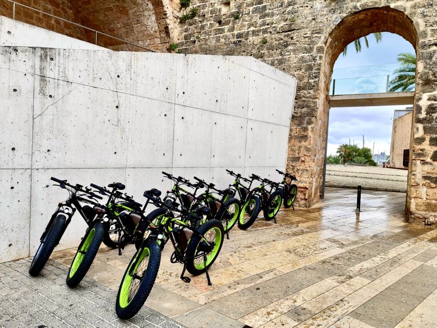 Palma: Guided City Tour with a Fat Tire E-Bike - Following Palma Bay Toward Portixol