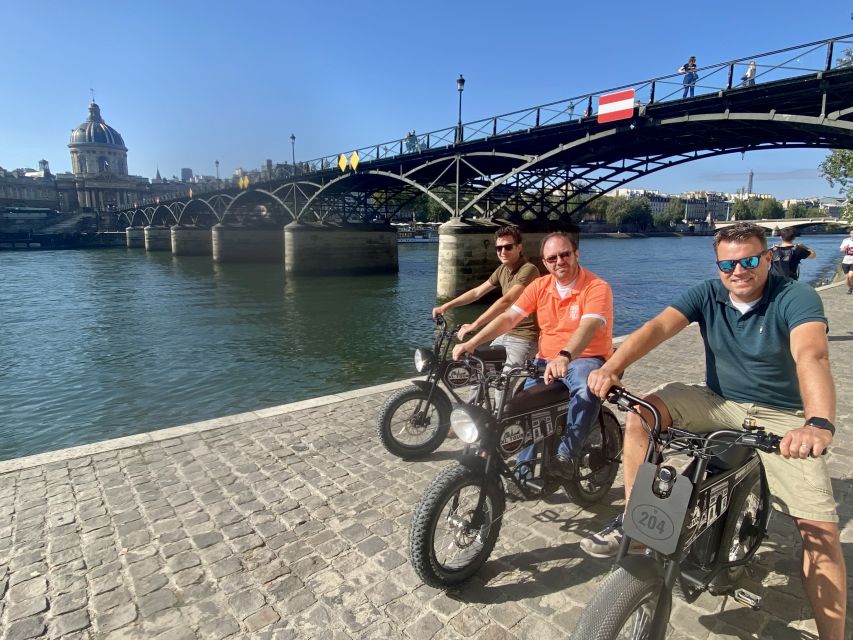 Paris: Eiffel Tower and Notre Dame Night Tour by E-Bike - Louvre and Tuileries: a grand opening