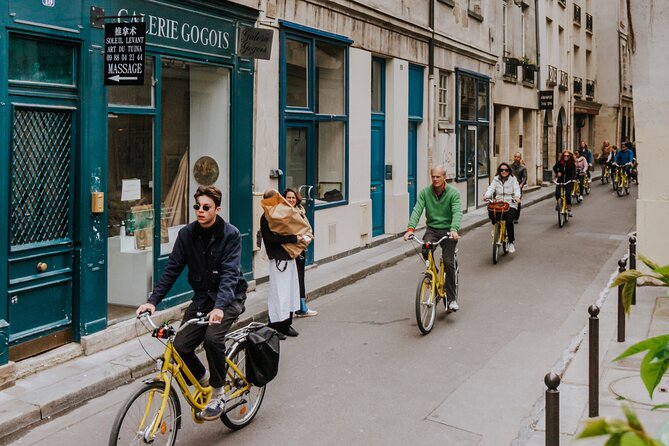 Paris Local Districts and Stories Off the Beaten Track Guided Bike Tour - Starting at Le Peloton Café near Hotel de Ville