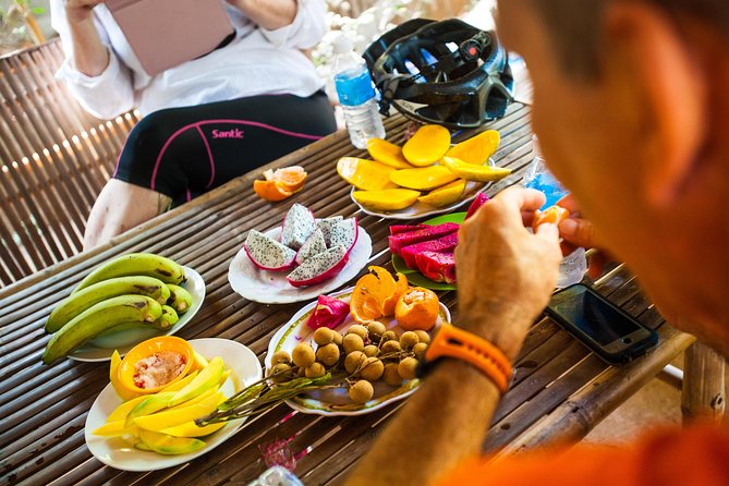 Phnom Penh: Cycling Adventure on Islands of the Mekong - The Lotus Silk stop and a family craft