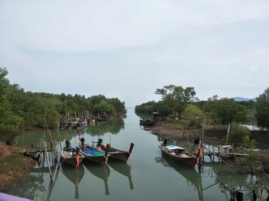 Phuket: Yao Island Cycling and Beach Day-Trip - Passing through the stilt fishing village