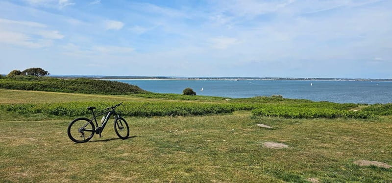 Poole: Old Harry Rocks and Corfé Castle Guided E-bike Tour - Sandbanks: an easy first photo stop
