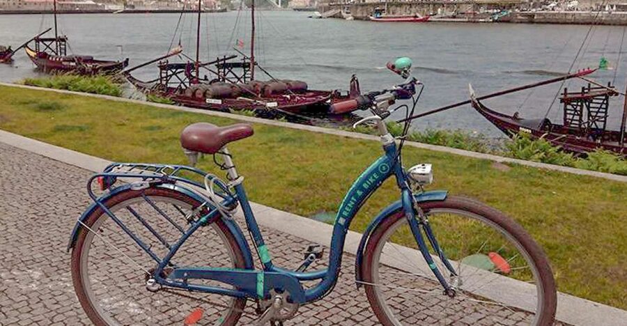 Porto: Self-Guided Bike and Boat Tour with Port Wine Tasting - Starting in Porto and crossing the Dom Luis I Bridge