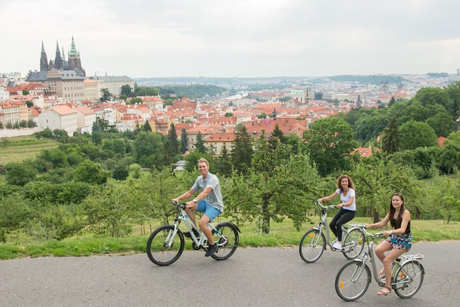 Prague E-Bike City Tour with A Local Guide - Lennon Wall and the riverfront show Prague’s modern side