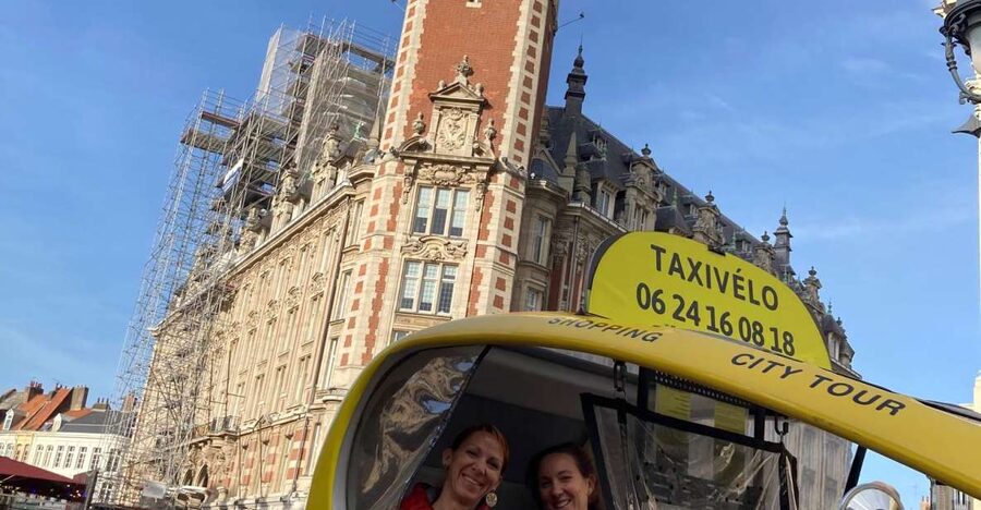 Private guided tour by electric bike taxi - Grand Place and the theater square