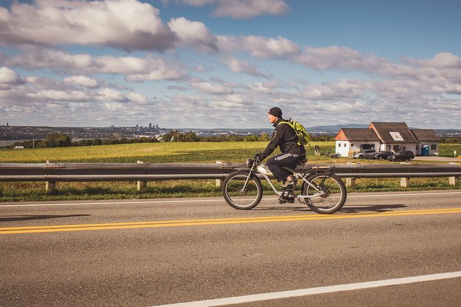Quebec City: Electric Bike Rental on Ile d'Orléans - Views toward the St. Lawrence River and Quebec City