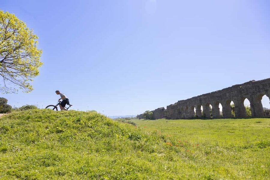 Rome: Appian Way & Aqueducts E-Bike Tour (Catacombs & Food) - Starting out on a full-suspension CUBE e-bike