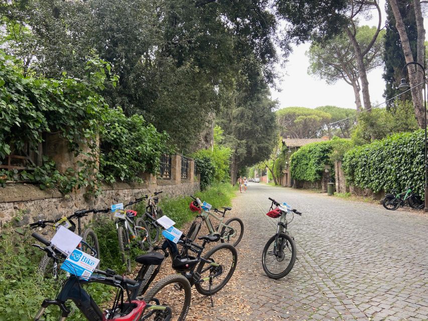 Rome: Appian Way Guided Tour on E-Bike with italian Aperitif - Returning along the Aurelian Walls