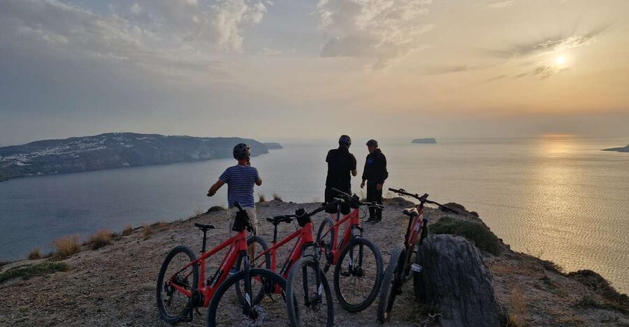 Santorini: E-Bike Sunset Tour Experience - Sunset over the caldera and the ride home