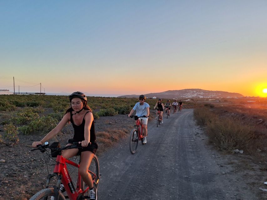 Santorini: E-Bike Sunset Tour Experience - Starting with Santorini’s tomato-making past