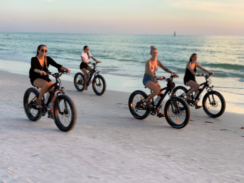 Sarasota: Siesta Key Electric Bike Sunset Tour - Champagne and the Patriots Point ceremony