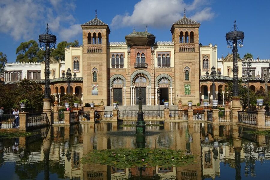 Seville: Electric Bike Tour in Small Group - Crossing into Triana