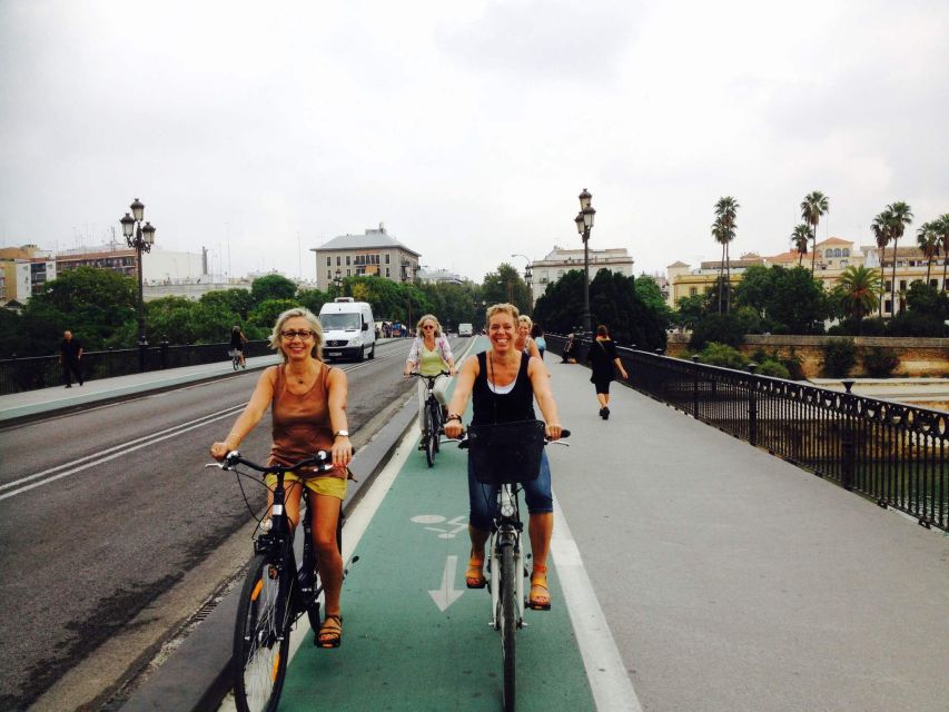 Seville: Highlights City Bike Tour - Maria Luisa Park offers a welcome change of pace