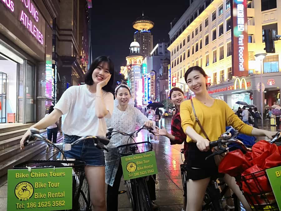 Shanghai: 4-Hour Nightlife Adventure & Tasting Bike Tour - Pudong towers and The Bund after sunset