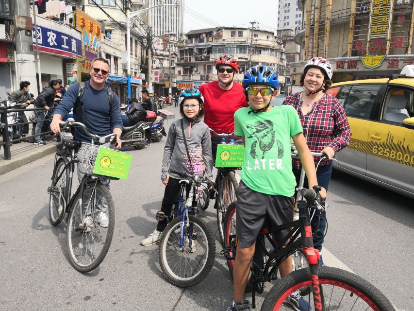 Shanghai: Full Day Classic Bike Tour With an Authentic Lunch - Nanjing Road and the city’s shopping pulse