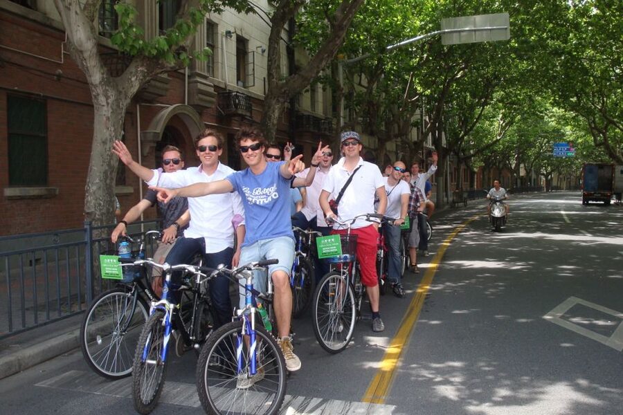 Shanghai: Half-Day Biking and Local Food Tour - Local food stops, snacks, and a filling finish