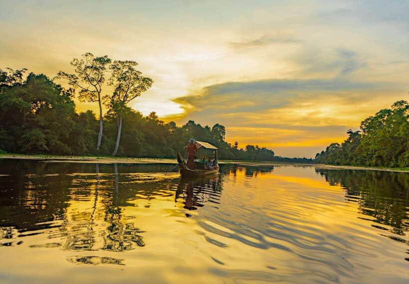 Siem Reap: Angkor Sunset Bike & Boat Tour /E-Bike Available - Crossing the Siem Reap countryside by bicycle