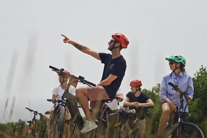 Small Group E-Bike Grand Cayman Ecological Half-Day Tour - Starting at The Grove and heading toward Seven Mile Beach