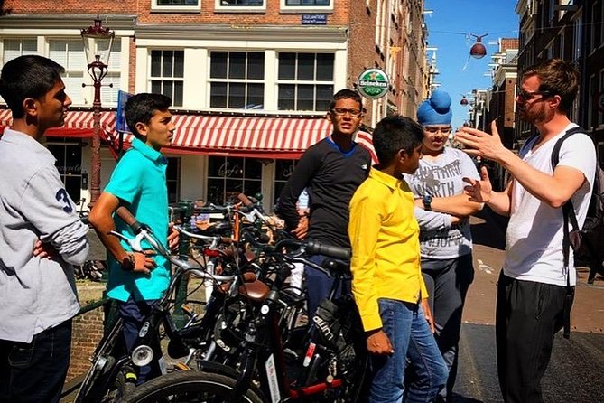 Small Group Guided Bike Tour of Amsterdam's Hidden Gems - Starting with canals and Amsterdam’s trading past